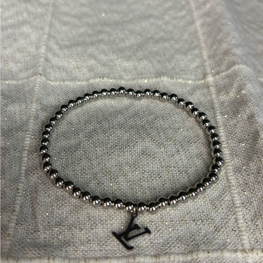 Silver Beaded Bracelet with Charm